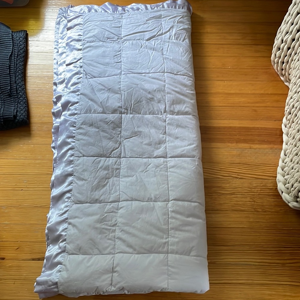 Pale purple quilted down comforter blanket